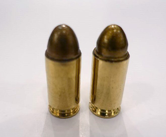 Automatic pistol bullet on left - Revolver bullet on right